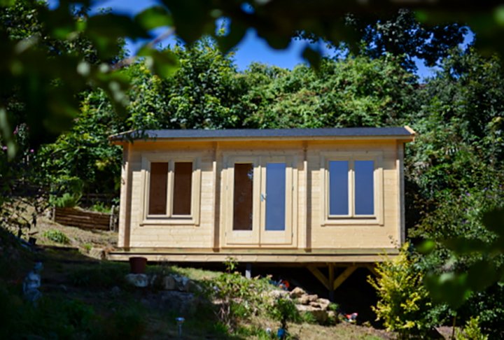 Log cabin on a slope